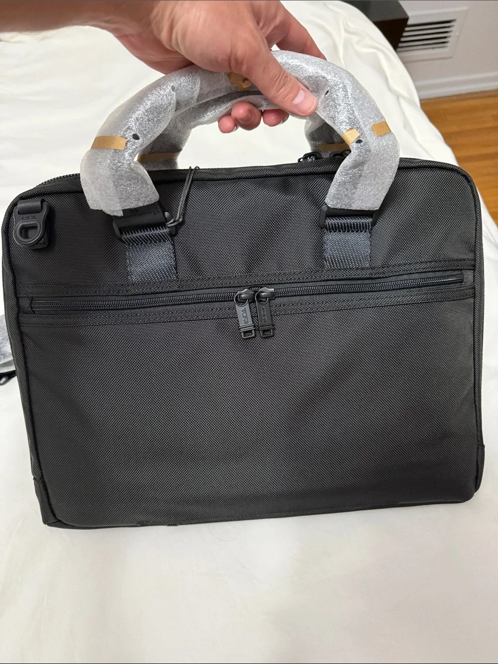 Tumi sleek black